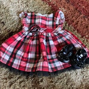 Carters newborn plaid dress and black shoes